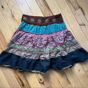 Multi color tired midi length skirt can be worn high waisted or not no flaws